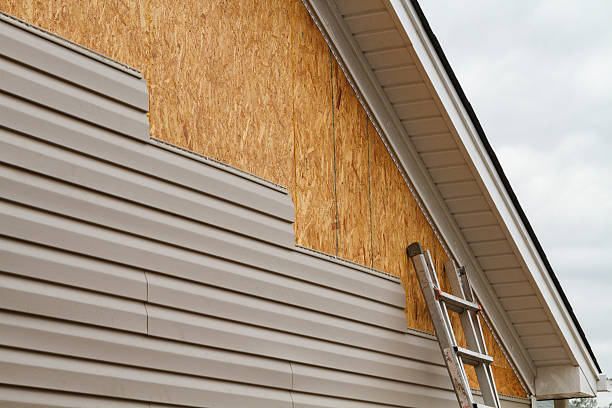 Professional Emergency Siding Repair technician working in Westwood, PA